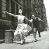 Carol Lawrence and Larry Kert running down the street in promotional photo for West Side Story.