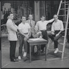 Stephen Sondheim, Arthur Laurents, Hal Prince, Robert Griffith (seated), Leonard Bernstein, and Jerome Robbins on the set of West Side Story.