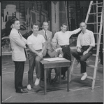 Stephen Sondheim, Arthur Laurents, Hal Prince, Robert Griffith (seated), Leonard Bernstein, and Jerome Robbins on the set of West Side Story.