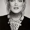 Rene Russo modeling Yves Saint-Laurent costume jewelry