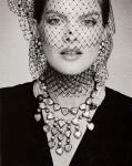 Rene Russo modeling Yves Saint-Laurent costume jewelry