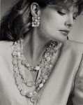 Rene Russo modeling Yves Saint-Laurent costume jewelry