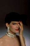 Rene Russo modeling Yves Saint-Laurent costume jewelry