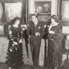 Rudolph Valentino (smiling) with two unidentified women.