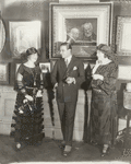 Rudolph Valentino (smiling) with two unidentified women.