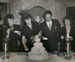 Gypsy Rose Lee (2nd from left) and unidentified guests at wedding reception