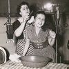 Publicity photograph of Gertrude Berg (combing hair) and Roslyn Silber for the radio program The Goldbergs