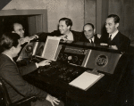 Adolph Deutsch, Mervyn LeRoy, Larry Hart, unidentified man, and Richard Rodgers in Warner Brothers Studio, Hollywood