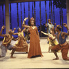 Actress Lorraine Toussaint (C) on stage surrounded by other unidentified actors during unconventional version of Shakespeare's play "A Midsummer Night's Dream"; produced by Joseph Papp for NY Shakespeare Festival.