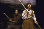 Daniel H. Jenkins as Huckleberry Finn (R) and Ron Richardson as runaway slave Jim (L) in musical "Big River"