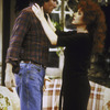 Stockard Channing (R) with hands on Jim Dale's (L) shoulders in the play "A Day In The Death Of Joe Egg"