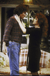 Stockard Channing (R) with hands on Jim Dale's (L) shoulders in the play "A Day In The Death Of Joe Egg"