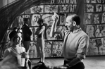 Choreographer Jerome Robbins (R) speaking with unidentified ballerina (L).