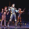 Robert Torti (C) and other dancer-actors, costumed as trains during a scene from the play "Starlight Express."