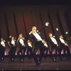 Actor Douglas Bates (C) w. cast in a scene fr. the National tour of the Broadway musical "Dancin'."