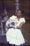 Actress Renee Harris w. "Toto" in a scene fr. the National tour of the Broadway musical "The Wiz." (Chicago)