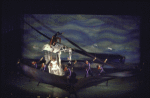 Actress Stephanie Mills (C) w. cast in tornado scene fr. the replacement cast of the Broadway musical "The Wiz." (New York)