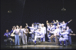 Actor David Alan Grier (Seated R) with cast in a scene from the Broadway musical "The First." (New York)