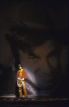 Actor Keith Carradine in front of backdrop of Will Rogers in a scene from the Broadway musical "The Will Rogers Follies." (New York)