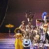Actor Keith Carradine (C) with cast in a scene from the Broadway musical "The Will Rogers Follies." (New York)