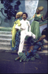 Actor Andre De Shields (C) w. cast in a scene fr. the Broadway musical "The Wiz." (New York)