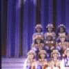 (Front L-R) Director Tommy Tune, actor Keith Carradine and choreographer Jeff Calhoun with cast in a publicity shot from the National tour of the Broadway musical "The Will Rogers Follies." (San Francisco)