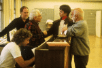 (L-R) Musical director Scott Frankel, Musical Supervisor Paul Gemignani, composer Leonard Bernstein, actor Scott Wise & director/choreographer Jerome Robbins around piano during rehearsal for the Broadway musical retrospective "Jerome Robbins' Broadway." (New York)