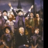 Actors (Rear L-R) Larry Shue, Cleo Laine, Betty Buckley, Jana Schneider, John Herrera and Joe Grifasi with cast in a scene from the New York Shakespeare Festival's production of the musical "The Mystery of Edwin Drood." (New York)