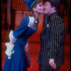 Actors Faith Prince and Nathan Lane kissing in scene fromBroadway musical revival "Guys and Dolls".