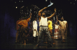 Actor Milton Craig Nealy (C) w. cast in a scene fr. the Playwrights Horizons' production of the musical "Once On This Island." (New York)