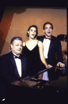 Actors (2L-R) Judy Kuhn and Jason Graae with pianist Fred Wells (L) in the musical revue "The Rodgers and Hart Revue", performed at the Rainbow and Stars nightclub. (New York)