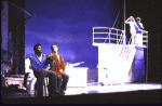 Actors (L-2L) Kevin Gray & John Rubinstein in a scene fr. the pre-Broadway production (which was aborted) of the musical "Kiss of the Spider Woman." (Purchase)