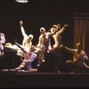 Actors John Rubinstein (on gurney) w. cast in a scene fr. the pre-Broadway production (which was aborted) of the musical "Kiss of the Spider Woman." (Purchase)