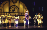 Actress Bernadette Peters (C) w. cast in a scene fr. the Broadway musical "The Goodbye Girl." (New York)