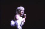 Gender illusionist Ken Sacha as Bette Midler in a scene fr. the  Radio City Music Hall revue "5-6-7-8- Dance!." (New York)