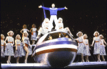 Actor Don Correia (C) w. the Rockettes in a scene fr. the  Radio City Music Hall revue "5-6-7-8- Dance!." (New York)