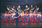 Actor Mickey Rooney (C) with the "Sugar Babies" in a scene from the Broadway musical burlesque revue "Sugar Babies." (New York)