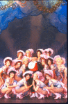 Actor Mickey Rooney (C) with the "Sugar Babies" in a scene from the Broadway musical burlesque revue "Sugar Babies." (New York)