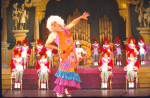 Actor Mickey Rooney (C) with cast in a scene from the Broadway musical burlesque revue "Sugar Babies." (New York)