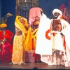 Actors (Center) Melba Moore & Ira Hawkins w. cast in a scene fr. the Broadway musical "Timbuktu!." (New York)
