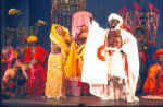 Actors (Center) Melba Moore & Ira Hawkins w. cast in a scene fr. the Broadway musical "Timbuktu!." (New York)