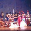 Actor Ira Hawkins (C) w. cast in a scene fr. the Broadway musical "Timbuktu!." (New York)