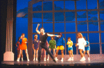 Actor Michael O'Gorman (C) with cast in a scene from the Broadway musical "Smile." (New York)