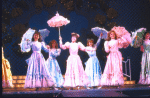 Actresses Anne Bobby (L) and Jodi Benson (2R) with cast in a scene from the Broadway musical "Smile." (New York)