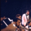 Actors (L-R) John Gordon, Vaughn DeForest, Adam Smith, Warren Meyers, Robert Weil, Cliff Gorman (as comedian Lenny Bruce), Ernie Furtado and Ron Odrich in a scene from the Broadway play "Lenny." (New York)