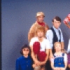 Actors (Top L-R) Hal Robinson, Gregg Edelman, Paul Kandel and Mark T. Fairchild; (Front L-R) Elizabeth Sung, Martin Moran, Julie Boyd, Stuart Bloom, Marin Mazzie and Laura Gardner in a scene from the National tour of the Broadway musical "Doonesbury." (New York)