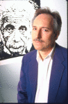 Actor Richard Davis Springle with a lithograph of scientist Albert Einstein in a scene from the Off-Broadway play "Einstein." (New York)
