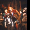 Actors (2L-4L) David Garlick, Braden Danner and Ron Moody with cast in a scene from the revival of the Broadway musical "Oliver!." (New York)