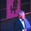 Actor Jack Gilford (L) performing at 100th birthday tribute to legendary Broadway director George Abbott (represented in cardboard cutout at R), "Happy Birthday, Mr. Abbott!." (New York)