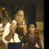 Actors (L-R) Victor Wong and Marc Hayashi in a scene from the New York Shakespeare Festival's production of the play "Family Devotions." (New York)